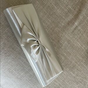 Elegant Silver Clutch with Bow Detail
